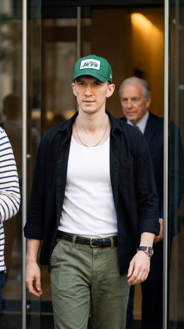 Man Leaving Hotel in Audi RS7