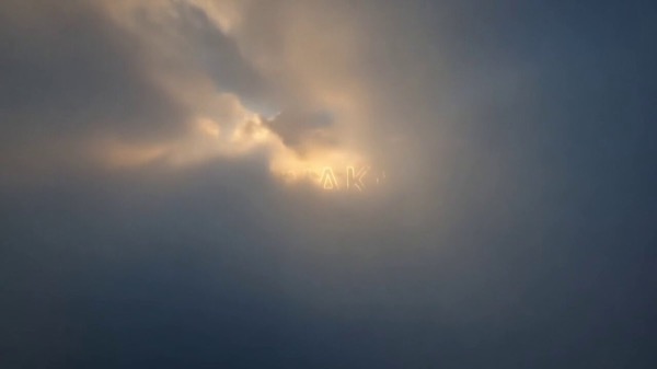 Sunrise Piercing Storm Clouds
