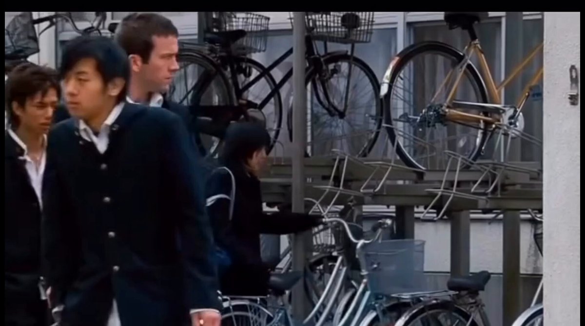 Motion Prompt: Slow cinematic side tracking shot, camera mov