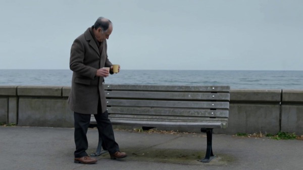 Elderly Man Seafront Bench