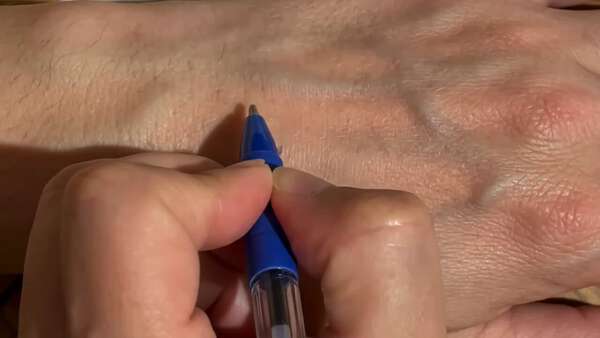 Pen Writing on Hand Animation